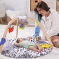 thumbnail image 2 of Melissa & Doug Ocean Easy-Fold Wooden Play Gym for Infants, Reversible Mat, 5 Soft Toys, Birth to 9 Months - FSC-Certified, 2 of 5