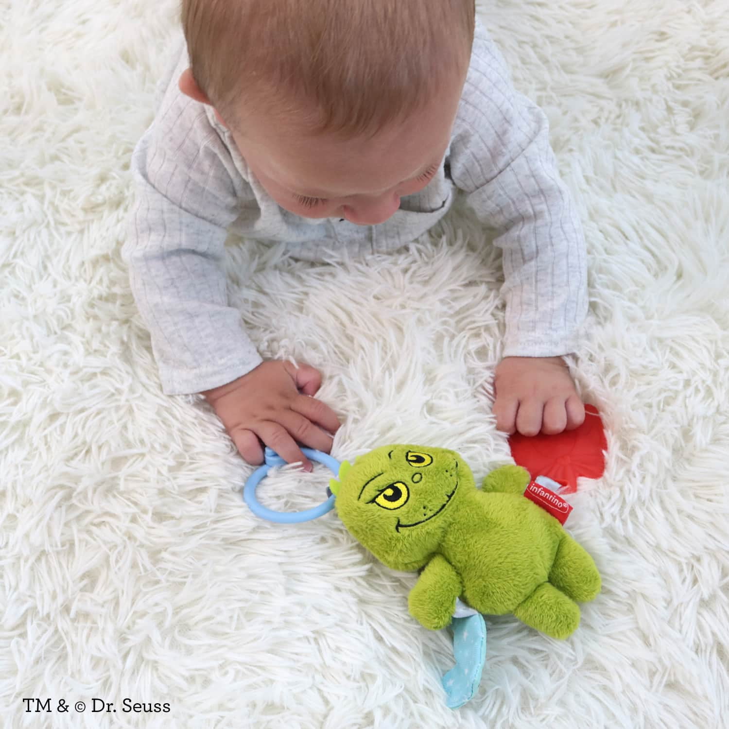 Infantino Chime & Go Tag Along Pal The Grinch, Soft Plush Baby Toy with Teether and Crinkle Tree