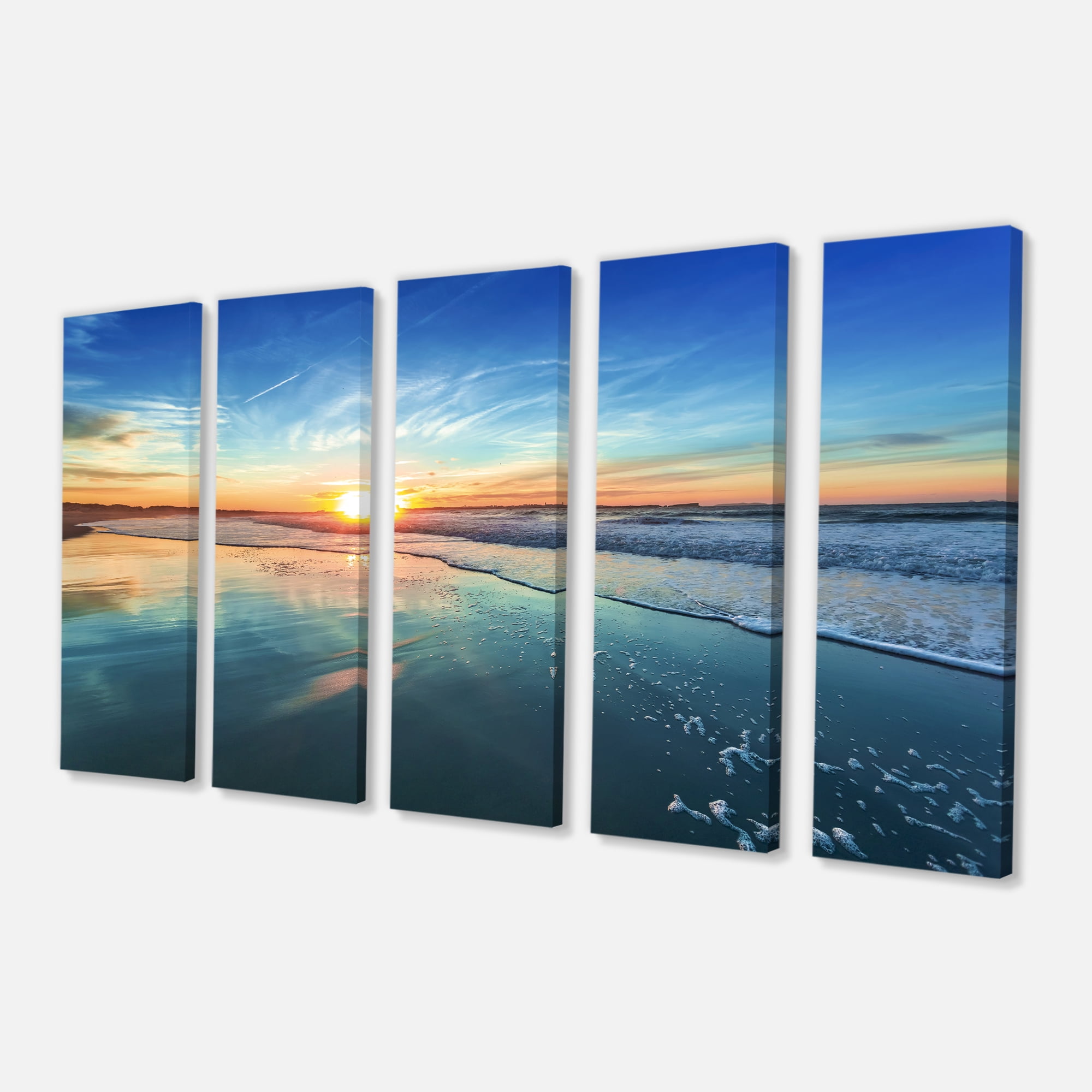 Designart 'Blue Seashore with Distant Sunset ' Seascape Canvas Art Print