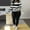 Black, variant on Homenesgenics Women's Casual Solid Color Long Sleeve Stripes Print Round-Neck Tops Pants Matching Sets