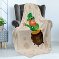 thumbnail image 4 of Leprechaun Soft Flannel Fleece Throw Blanket, Happy Waving Irish Character in a Coin Pot on Clover Silhouettes, Cozy Plush for Indoor and Outdoor Use, 50" x 70", Pale Tan Multicolor, by Ambesonne, 4 of 5