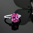 thumbnail image 4 of Gem Stone King 925 Sterling Silver 10X8MM Oval Pink Created Sapphire and White Moissanite 3-Stone Women Ring | 3.28 Cttw | Available in Size 5, 6, 7, 8, 9, 4 of 4
