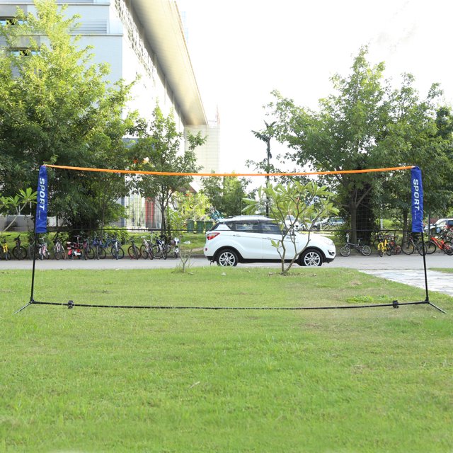red de bádminton portátil plegable estándar profesional deportes al aire libre ehuebsd voleibol tenis entrenamiento red cuadrada malla Vista frontal de red de bádminton portátil Ehuebsd con barra superior naranja, postes negros con fundas azules y malla negra cuadrada instalada sobre césped en un parque; disponible en tamaños hasta 6,1 x 0,86 m.