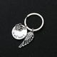 thumbnail image 3 of Pet Footprint Keychains de la llave del ala del ángel Anillos de la llave de metal adornados Costilización de artesanía fallecida, 3 of 6