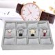 thumbnail image 5 of Caja De Almacenamiento De Reloj De 12 Rejillas, Bandeja De Organizador De Exhibición De Joyería Gris Con Almohada Para Pulseras De Relojes, Estuche De Joyería, 5 of 9