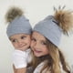 thumbnail image 3 of Gorro de bebé con pompón falso Negro, 3 of 9