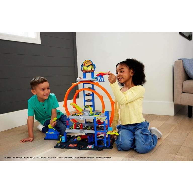 Hot Wheels Mega Loop Garage Playset with 1:64 Car & Helicopter