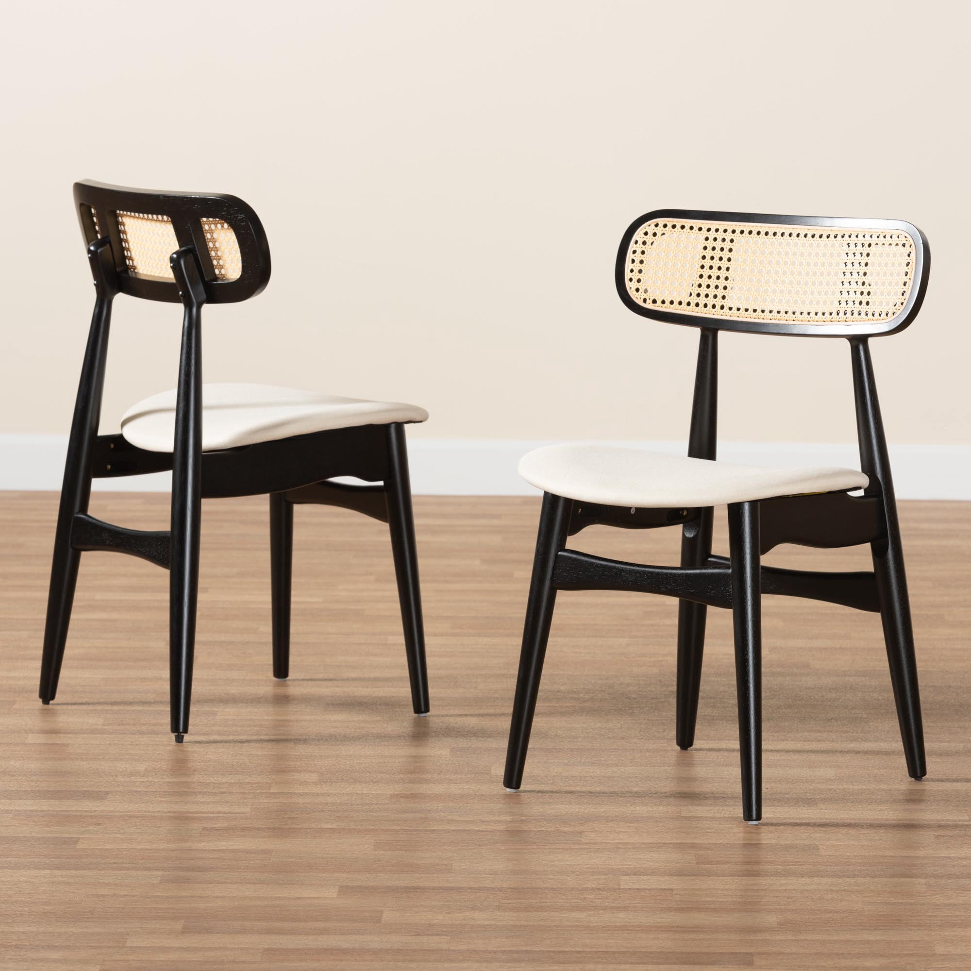 Baxton Studio Darrion Mid-Century Modern Cream Fabric and Black Finished Wood 2-Piece Dining Chair Set