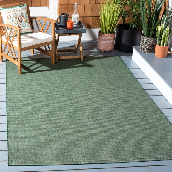 Safavieh Courtyard Sloan Solid Indoor/Outdoor Area Rug, Dark Green/Beige, 5'3" x 7'7"