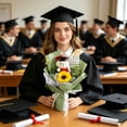 thumbnail image 4 of Ramo de peluches con aroma a girasoles para graduación: un adorable peluche con aroma a girasoles, tejido suave y decoración festiva para ceremonias o fiestas de graduación., 4 of 5