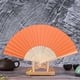 thumbnail image 1 of Abanico de papel plegable de 7 pulgadas 007 Naranja, Abanico de boda de danza de patrón plegable de encaje de seda de color sólido, 1 of 2