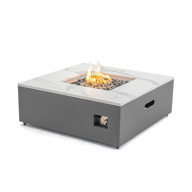 Square Danby propane fire table with white and grey engineered marble top, featuring a central flame surrounded by decorative stones.
