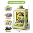 thumbnail image 4 of Mini máquina expendedora Claw Machine Jovow con monedas de juego y música para niños, 4 of 7