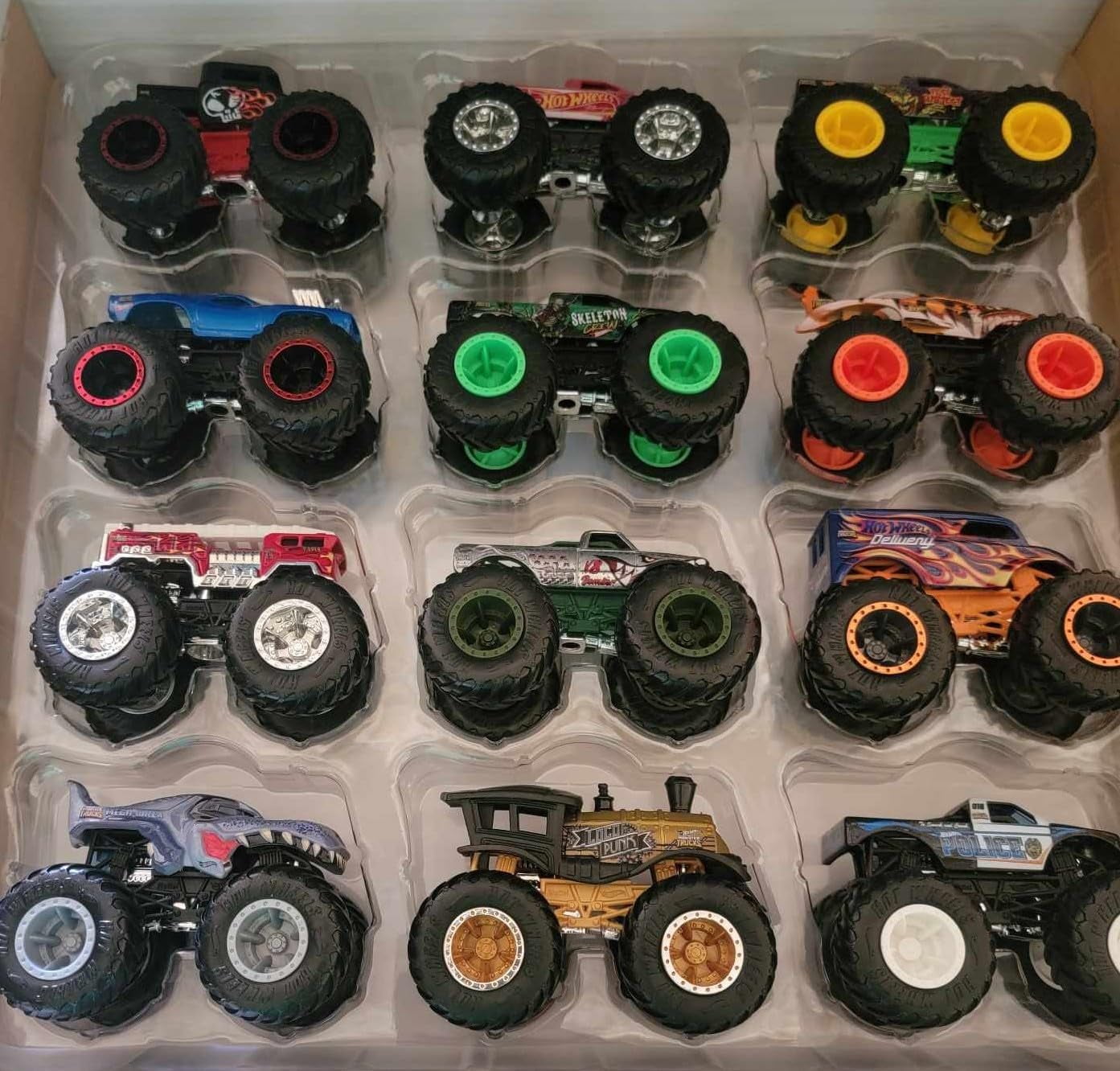 Hot Wheels Monster Trucks 1:64 Scale Die-Cast Ultimate Chaos 12 Pack Toy Vehicles for Kids Ages 3 years and older