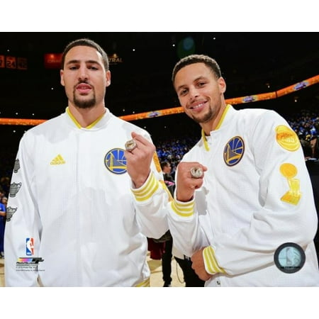 Klay Thompson & Stephen Curry pose with their 2015 NBA Championship Rings Photo