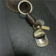 thumbnail image 1 of Llavero con colgante de Metal y bronce para hombre y mujer, accesorio de aleación móvil con diseño de Robot, Estilo Vintage, joyería de moda, 1 of 5