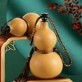 thumbnail image 5 of Handwoven Natural Gourd Water Bottle with Beeswax Seal, Wooden Beverage Container for Daily Drinking and Home Decor, Yellow, 5 of 6