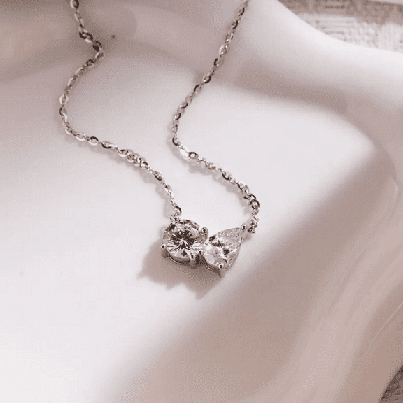 Radiant Jewelry 2 CT Toi et Moi Moissanite Pendant Necklace Round & Pear Cut | GRA Certified | 14K White Gold Plated 925 Sterling Silver | 18" Chain