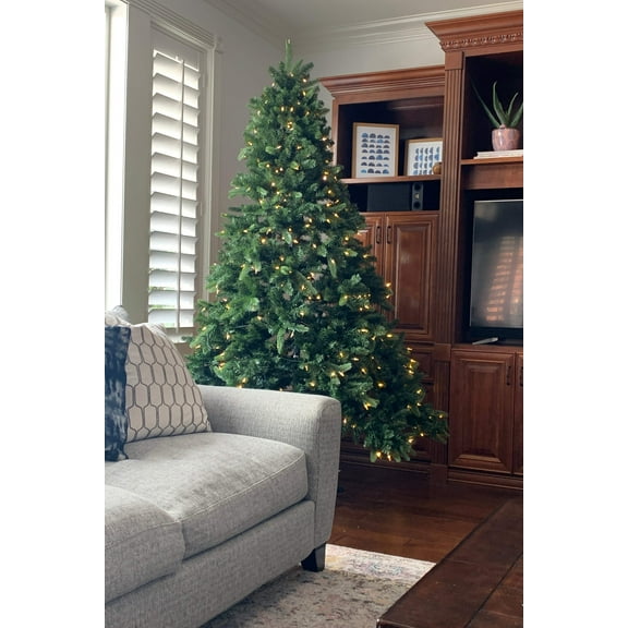 Perfect Holiday 5 Ft Prelit Spruce Christmas Tree, crafted with 529 realistic tips and 250 clear LED Bulbs with Metal Stand, Green