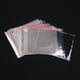 thumbnail image 1 of 100 bolsas resellables transparentes con autoadhesivo de plástico OPP para golosinas de alimentos., 1 of 2