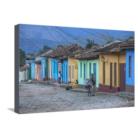 Cuba, Trinidad, a Man Selling Sandwiches Up a Colourful Street in Historical Center Stretched Canvas Print Wall Art By Jane