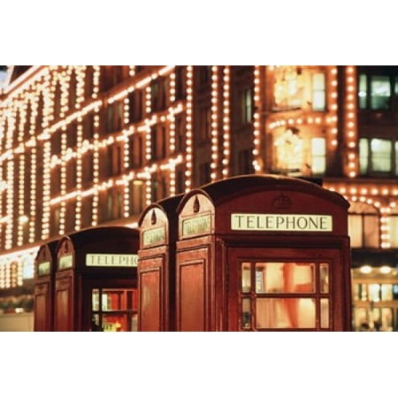 Lit Telephone booth at Harrods Knightsbridge London England Canvas Art - Walter Bibikow DanitaDelimont (35 x 23)