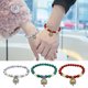 thumbnail image 1 of Pulsera de cuentas turquesa luminosa - pulsera energética de yoga de 8 mm para mujeres y hombres, elástico ajustable, 1 of 4