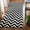 Black/Ivory, variant on SAFAVIEH Dhurrie Bentley Chevron Zigzag Wool Area Rug, Green/Ivory, 2'6" x 4'