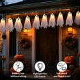 thumbnail image 6 of JIhuahe 8.2 FT Hanging Ghost String Lights with 10 Glowing Screaming Phantoms, LED Decor for Front Yard Patio, Garden Party Fireplace Indoor Setup, 6 of 8