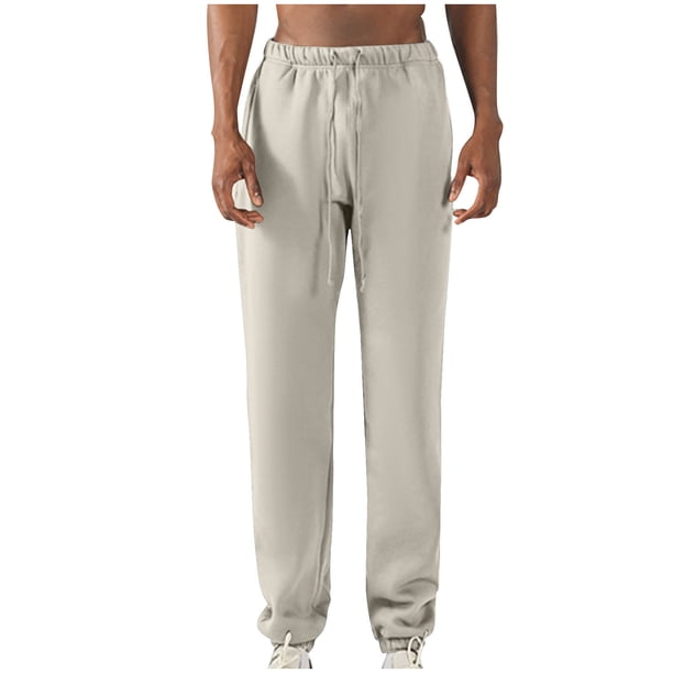 Pantalones largos para hombre, con cintura elástica, color liso, con cordón y bolsillos, de poliéster.
