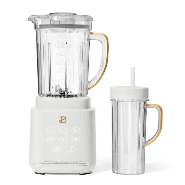 White Beautiful by Drew Barrymore PowerExact Blender System featuring a clear blender jar with gold-accented handle and matching travel cup with lid