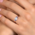 thumbnail image 4 of Gem Stone King 18K Rose Gold Plated Silver White Moissanite and Blue Tanzanite Engagement Ring for Women | 1.26 Cttw | Oval 7X5MM | Gemstone Birthstone | Size 8, 4 of 7