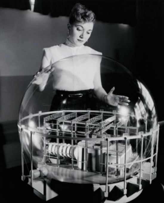 Young woman looking at a model of a nuclear reactor covered with sphere surrounding to protect against radioactivity Knolls Atomic Power Laboratory General Electric Schenectady New York USA Canvas Art