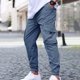 thumbnail image 1 of Pantalones largos estilo cargo para hombre, informales, holgados, con bolsillos y cordón, para ejercicio al aire libre, de poliéster., 1 of 9