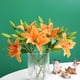 thumbnail image 4 of Flor artificial de lirio de plástico con forma de varilla corta y tacto real de una sola película para decoración de bodas, 4 of 6