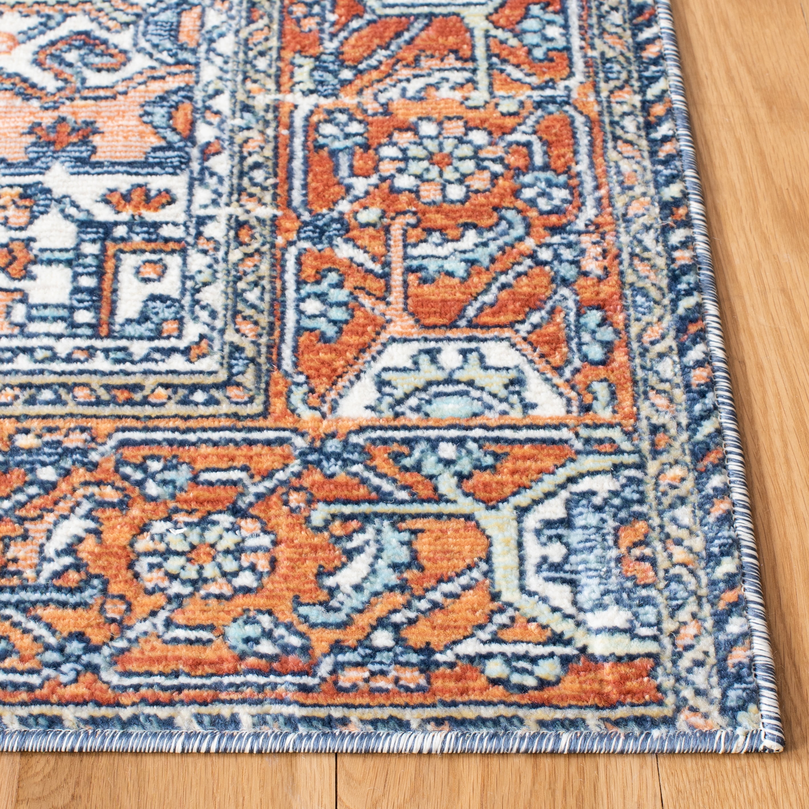 SAFAVIEH Aria Gligor Oriental Area Rug, Navy/Rust, 5'3" x 7'7"