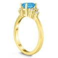 thumbnail image 2 of SZUL Women's 7X5MM Blue Topaz and Diamond Regal Ring in 10K Yellow Gold, 2 of 4