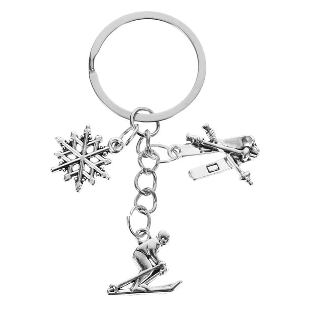 Llavero de snowboard con colgante de copo de nieve y esquiador, de metal, para hombre y mujer, para Navidad y cumpleaños.