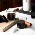 thumbnail image 4 of Ochine 2.5-Ounce Espresso Measuring Glass with Wooden Handle Double Spouts Espresso Shot Glass Measuring Cup Pitcher Barista Measuring Cups for Coffee Tea Milk Espresso Maple Syrup Juice Wine Serving, 4 of 10