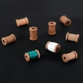 thumbnail image 6 of 50pcs Coconut Brown Wooden Spools 0.6x0.4 inch Unfinished Empty Thread Spool Mini Wood Bobbins Wooden Empty Spools Natural Wire Weaving Bobbins for Arts DIY Wood Projects Wire Weaving DIY, 6 of 6