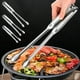 thumbnail image 1 of Pinzas de Acero Inoxidable para Barbacoa con Mecanismo de Bloqueo - Pinzas Dentadas para Asar Carne | Pan | Hornear y Cocinar Al Aire Libre - Pinzas para Alimentos de 30 Cm, 1 of 5