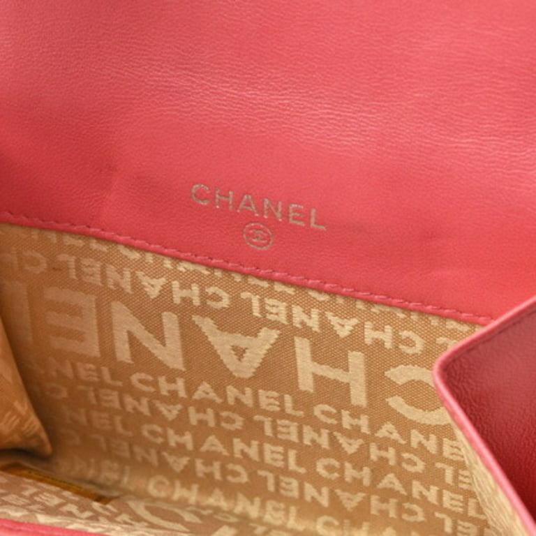 Pre-Owned Chanel wallet CHANEL folding lambskin icon coral pink