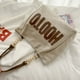 thumbnail image 1 of Bolso de lona para estudiantes universitarios, bolso grande para mujer, bolso de mano de gran capacidad para viajes diarios en otoño, 1 of 6