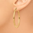 thumbnail image 4 of FJC Finejewelers 14 kt Yellow Gold Polished 2.5mm Lightweight Tube Hoop Earrings, 4 of 6
