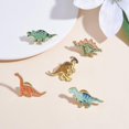 thumbnail image 3 of Set de 5 o 7 broches de dinosaurios esmaltados. Accesorios para mochilas, insignias, gorras y bolsos., 3 of 9