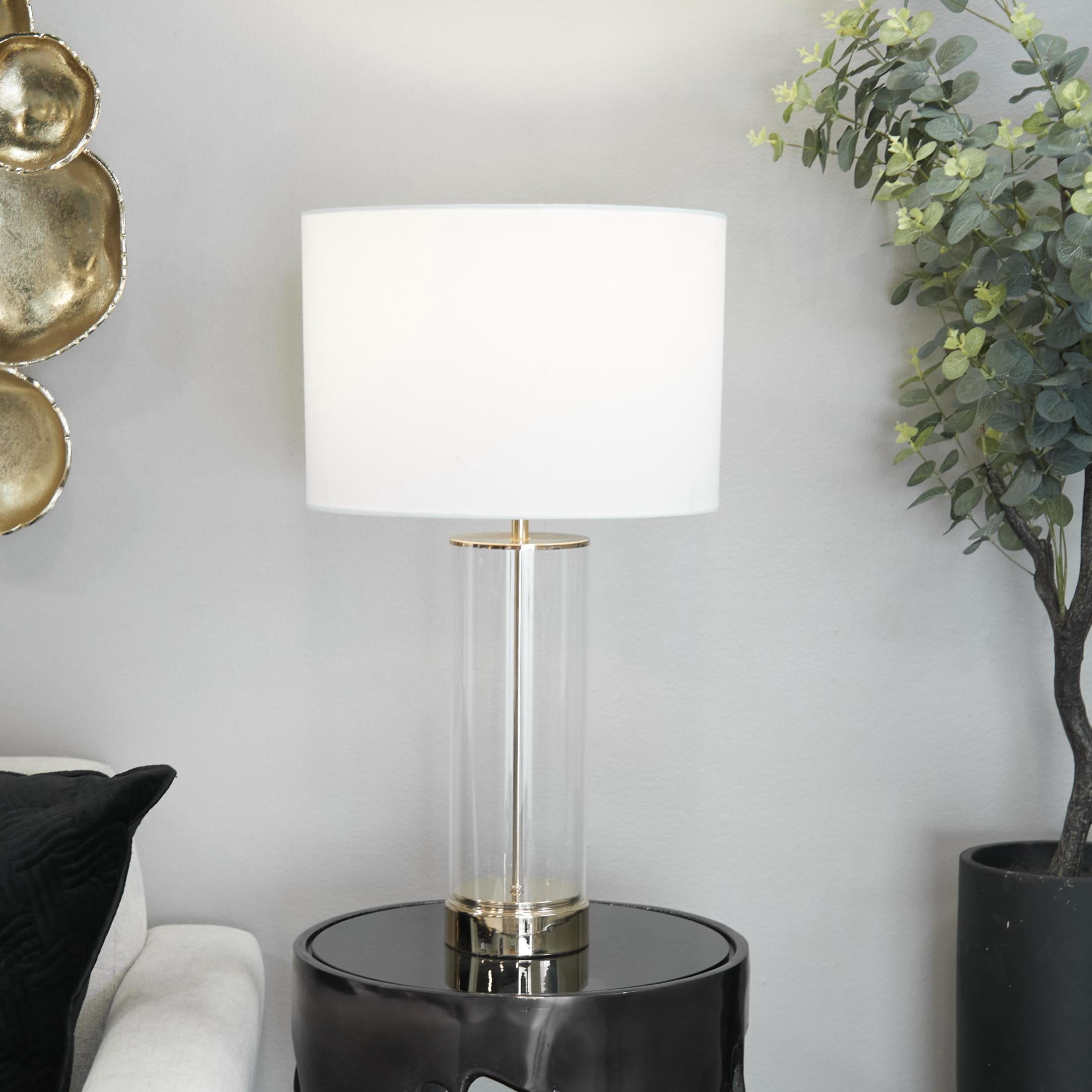 CosmoLiving by Cosmopolitan 25" Transparent Base Gold Table Lamp with Cream Linen Shade