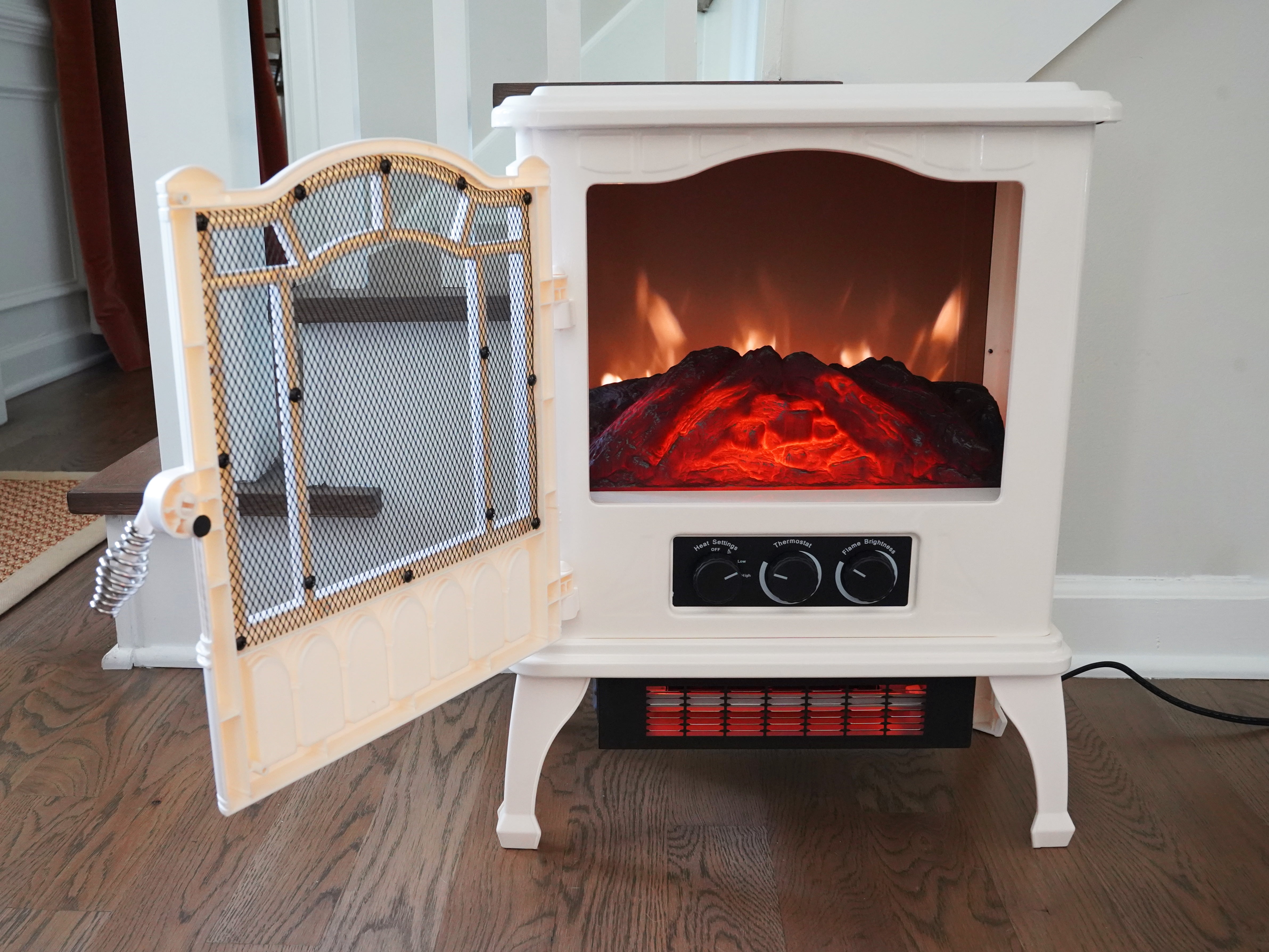 Mainstays 1500w 2-Setting 3D Electric Stove Heater with Life-like Flame,  Black - Walmart.com