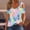 Tops-90Light Blue, variant on Xdegoge Tees for Women V Neck Cold Shoulder Tropical Leaf Floral Regular Fit Tops O Ring Short Sleeve Blouses Summer Beach Vacation Outfits