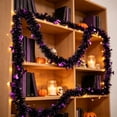 thumbnail image 7 of 9.2Ft Halloween Tinsel Garland with Bat Cutouts, Spooky Metallic Tinsel Vine for Fireplace Mantel, Stair Railing, Wall Backdrop, Haunted House, Indoor Outdoor Halloween Party Home Decor Decorations, 7 of 7