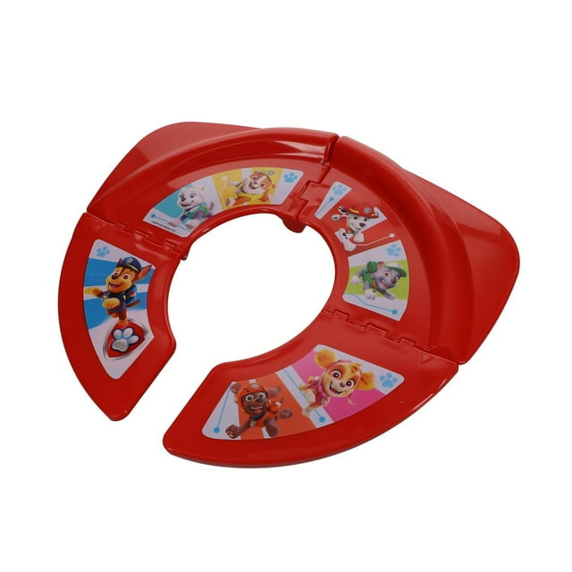 Nickelodeon PAW Patrol "Born Brave" Folding Potty Seat in red with fold-flat locking design and PAW Patrol character decals, offering a compact, portable potty training seat ideal for travel and on-the-go use.